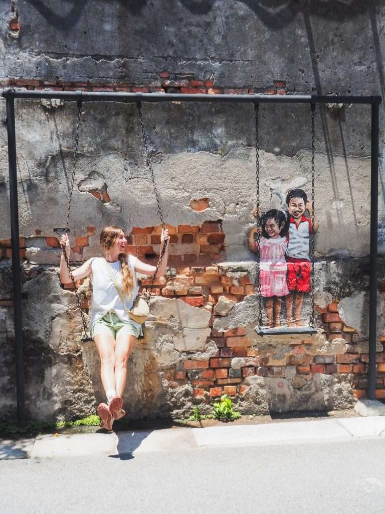 Niños en un columpio, ruta por Malasia y Singapur , Malaysia and Singapore itinerary